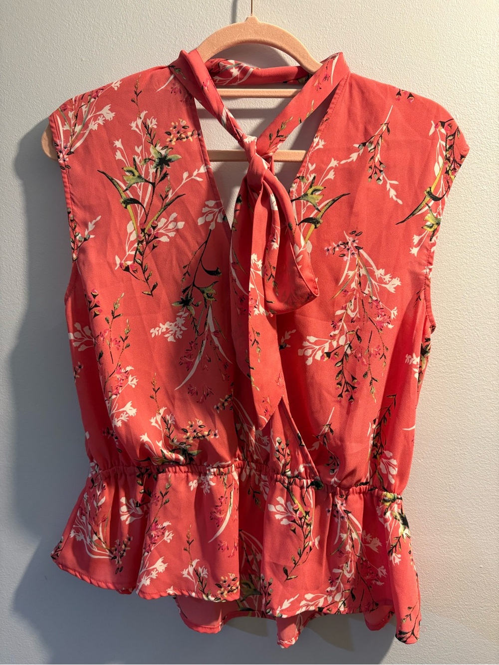New York & Company Coral Floral Tie-Neck Peplum Top